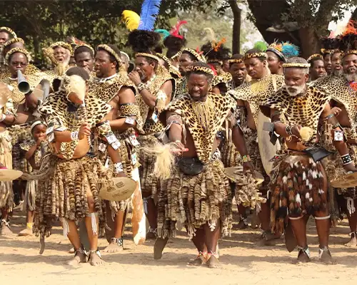 Group of people wearing traditional clothing during a cultural gathering, Shembe Dancers.